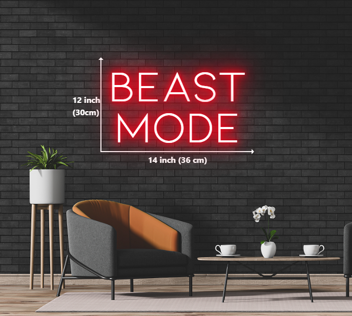 Neon sign with the empowering message 'Beast Mode'.